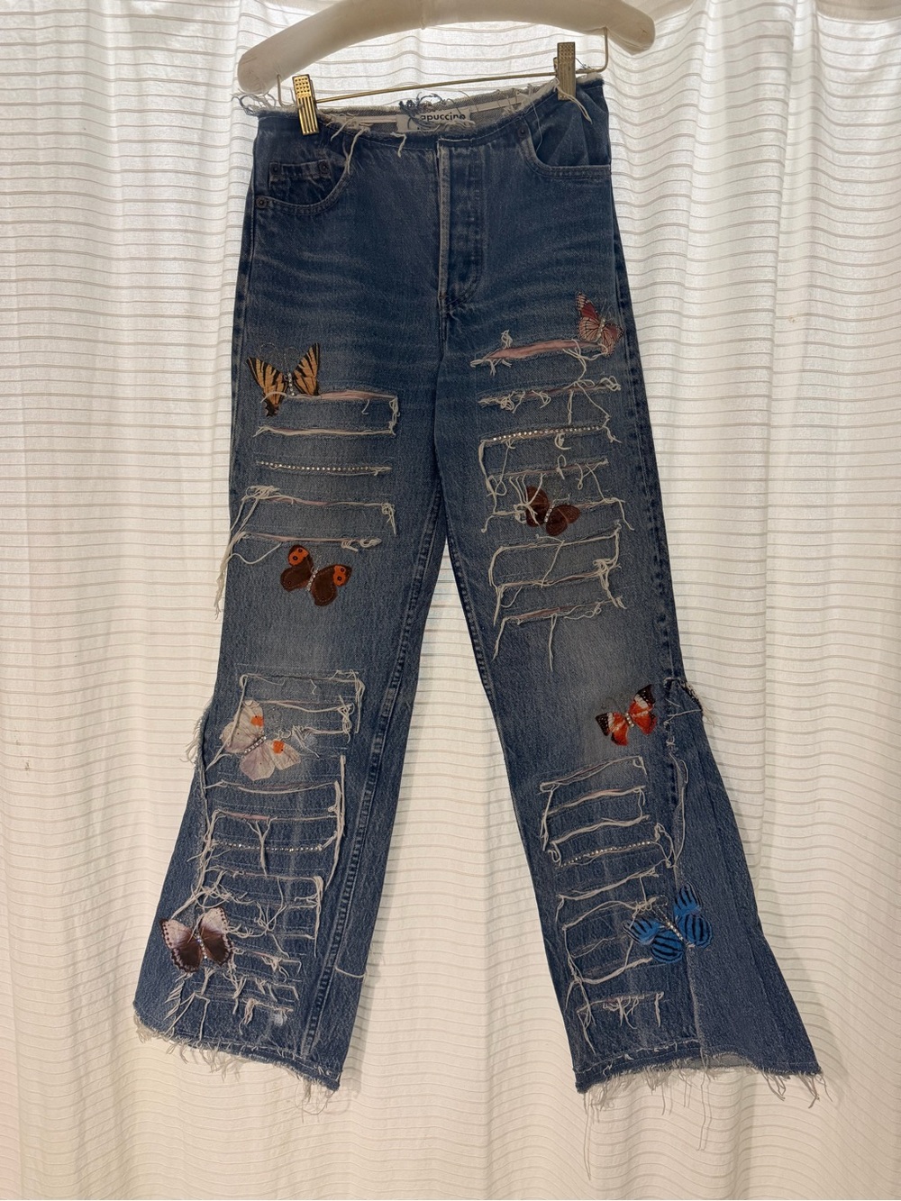 Distressed Light Blue Wide-Leg Jeans